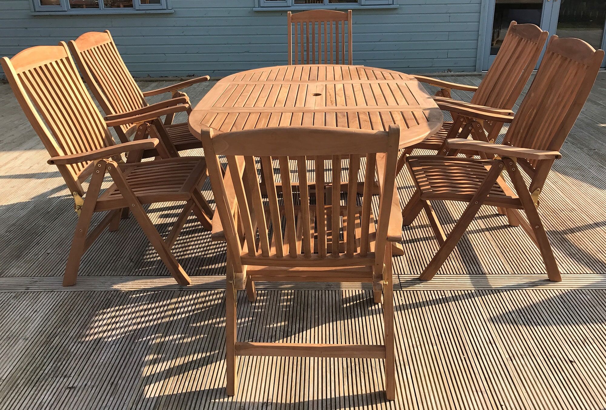 6 Seater Ambleside Teak Garden Dining Set - Ambleside 1.2m-1.8m Round Extending Table with 6 Teak Recliner Armchairs