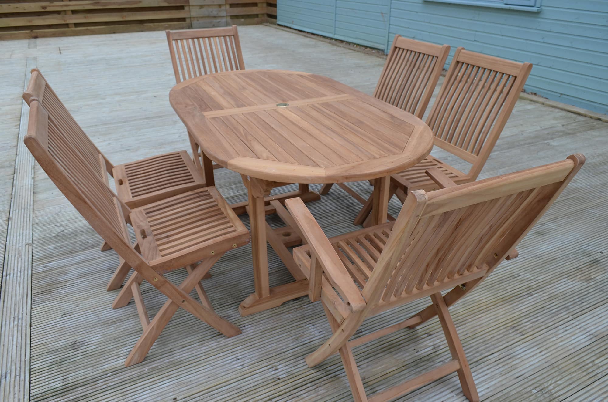 6 Seater Acle Teak Garden Dining Set - Acle 1.6m Oval Fixed Table with 2 Premium Folding Armchairs and 4 Premium Folding Chairs
